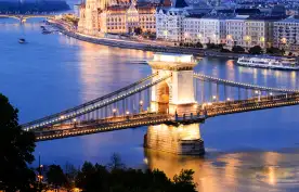 Chain Bridge and city skyline at night in Budapest, Hungary