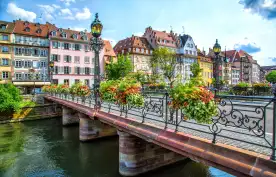 Pretty bridge across a waterways of Strasbourg, capital city of the Alsace region, France