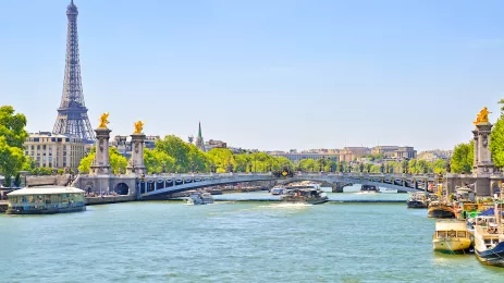 The Seine river with Alexandre III bridge and Eiffel Tower in the background