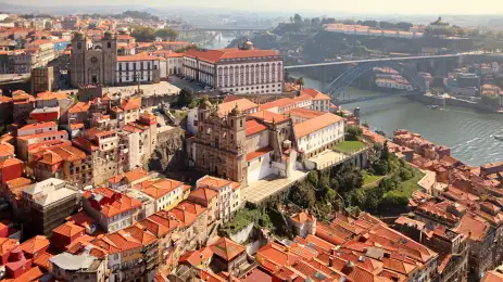 An aerial shot of the Porto Cathedrals next to the Douro River, Portugal