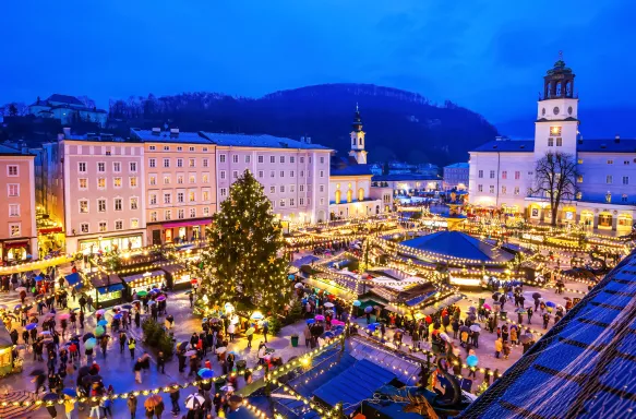 Aerial view of Salzburg's Christmas Market illuminated at night in Austria
