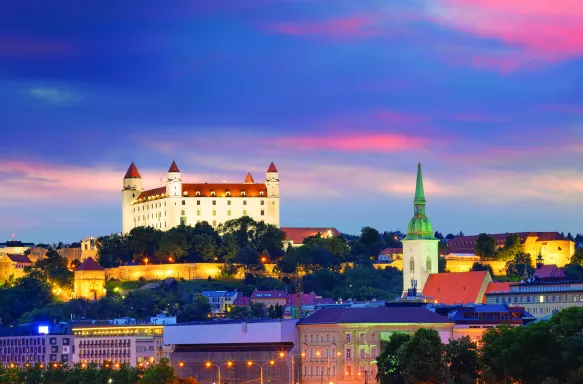 View of Bratislava Castle from the river under a colour evening sky